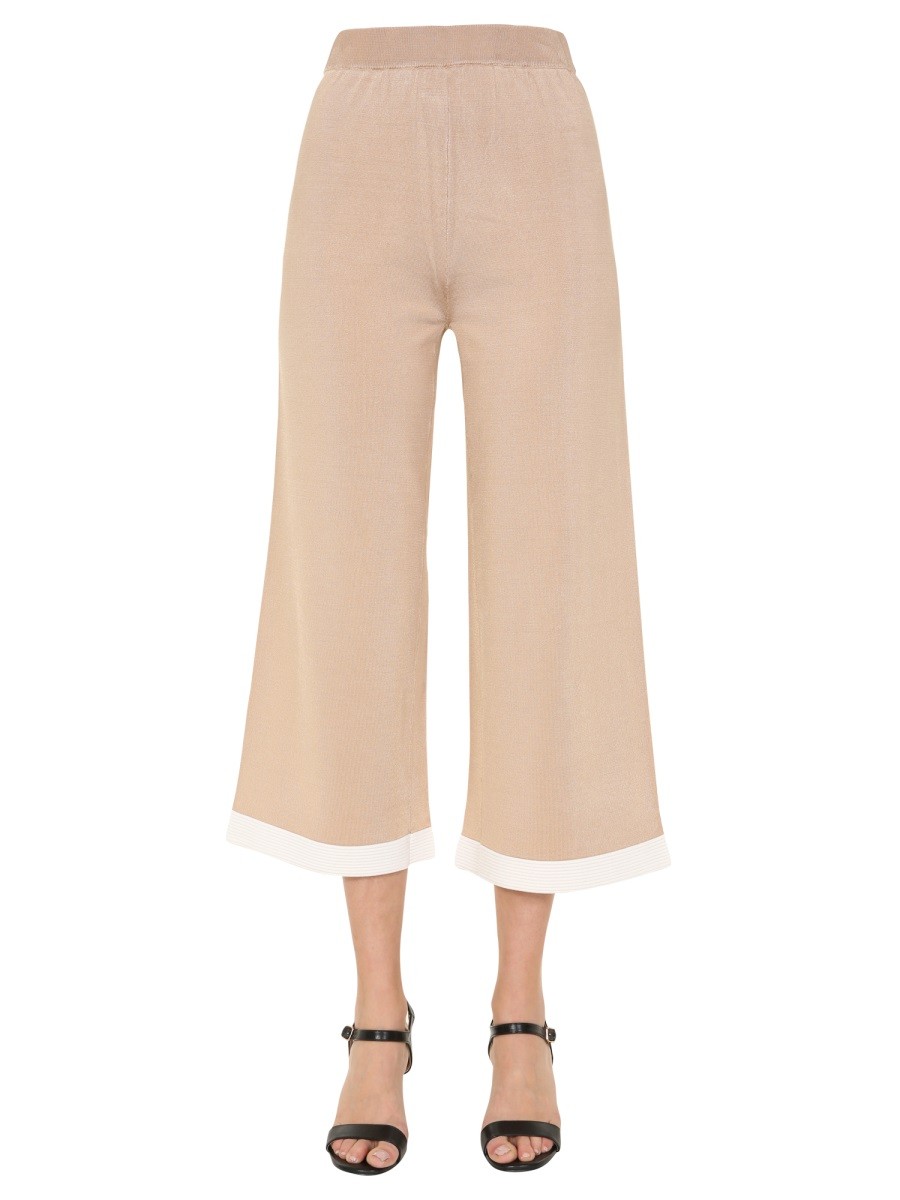 Refresh your wardrobe with the Boutique Moschino women's CROPPED TROUSERS in beige