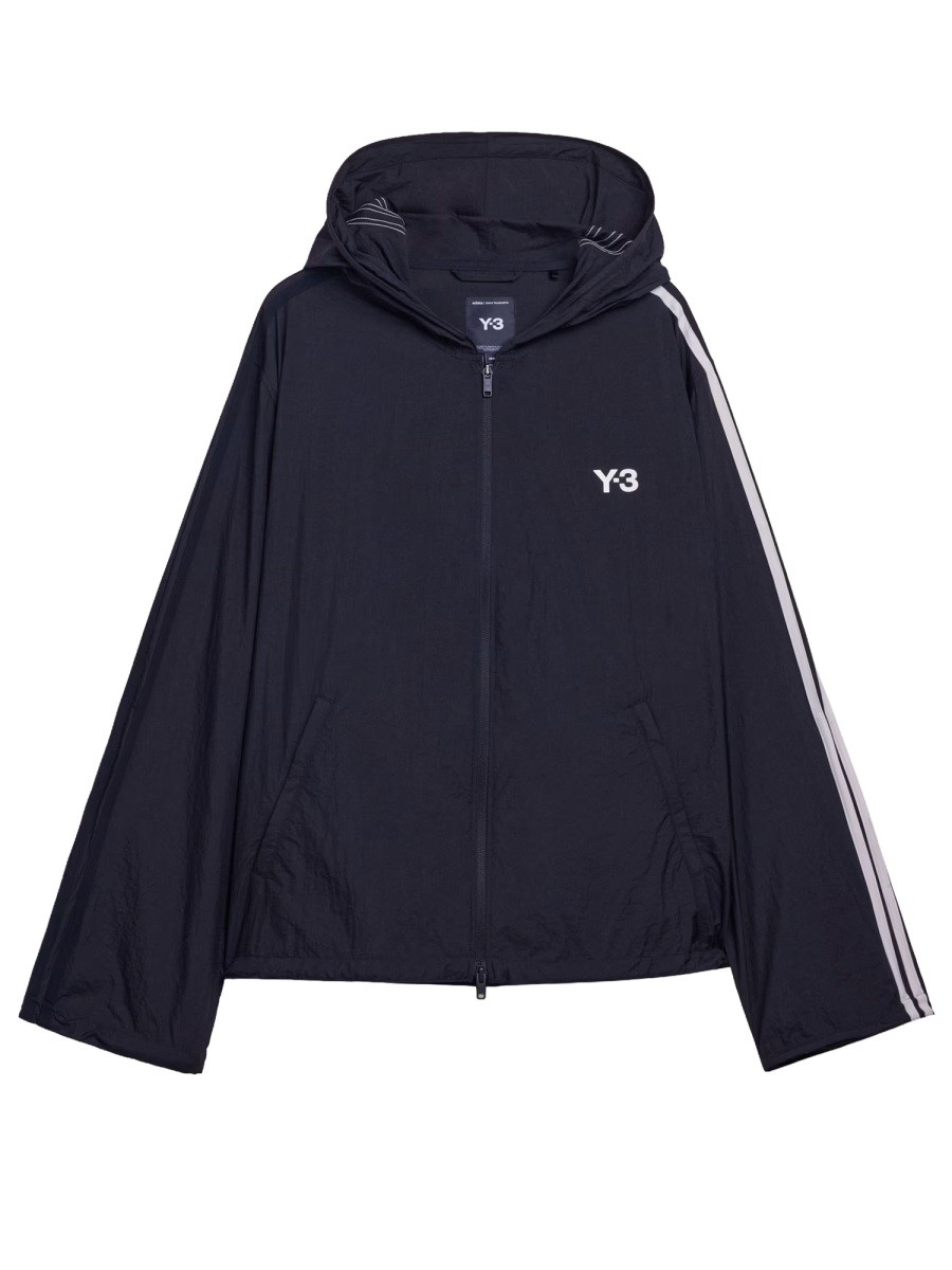 Refresh your wardrobe with the Y - 3 unisex "3 STRIPES" SPORTS JACKET in Black