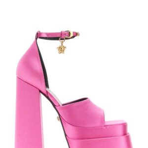 Explore the authentic Versace women's AEVITAS MEDUSA PLATFORM SANDALS in Pink