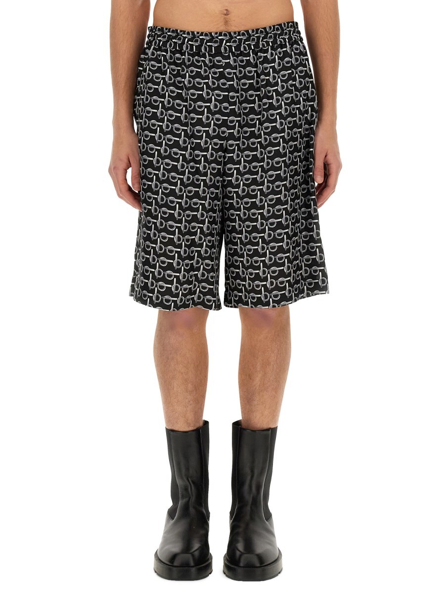 Explore the authentic Burberry men's ALL OVER PRINT BERMUDA SHORTS in Black