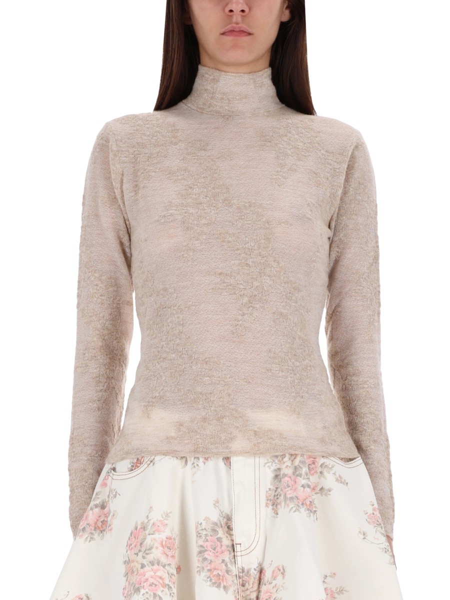 Discover the authentic GANNI women's ALPACA BLEND SWEATER in beige
