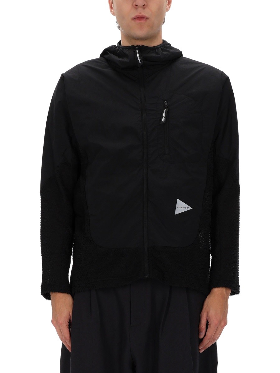 Refresh your wardrobe with the AND WANDER men's "ALPHA DIRECT" JACKET in Black