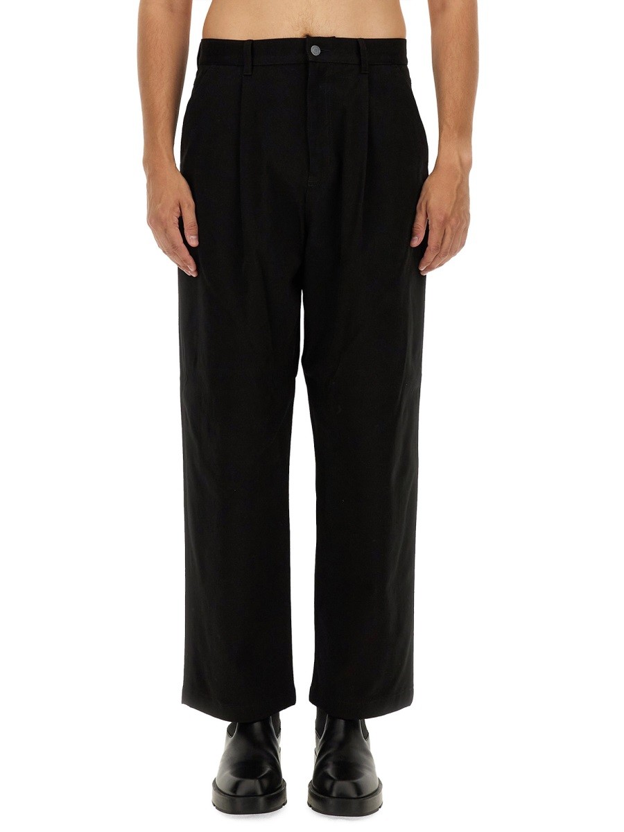 Refresh your wardrobe with the Moschino men's BARCODE PANT in Black