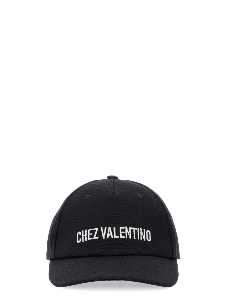 Explore the authentic Valentino Garavani men's BASEBALL CAP WITH EMBROIDERY in Black