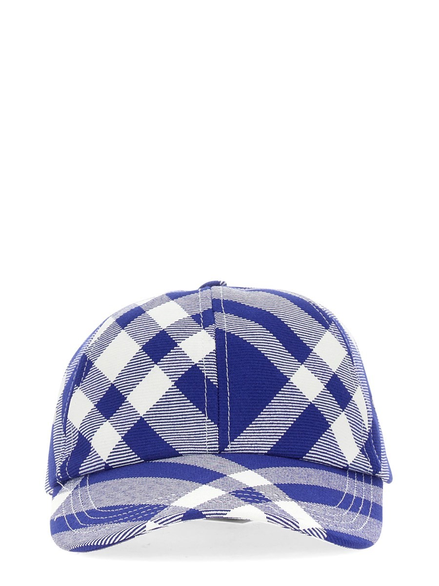 Explore the authentic Burberry unisex BASEBALL CAP WITH TARTAN PATTERN in Purple