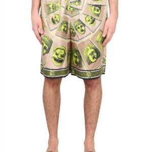 Discover the authentic Versace men's BERMUDA SHORTS THE MASKS in GREEN