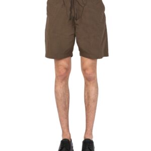 Explore the authentic UNIVERSAL WORKS men's BERMUDA WITH CHECK PATTERN in Brown
