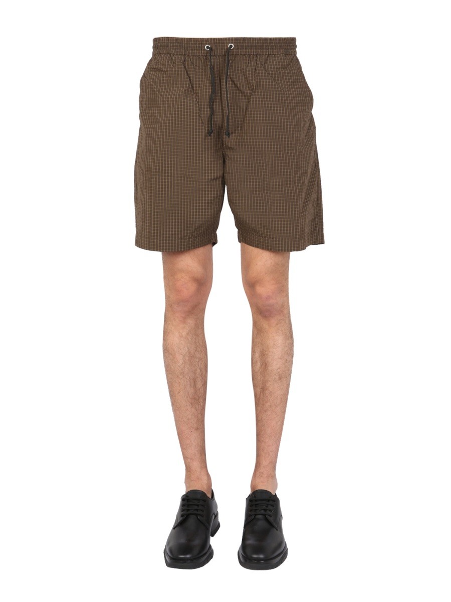 Explore the authentic UNIVERSAL WORKS men's BERMUDA WITH CHECK PATTERN in Brown