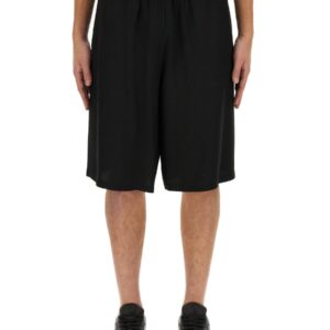 Refresh your wardrobe with the Moschino men's BERMUDA WITH LOGO in Black