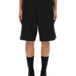 Refresh your wardrobe with the Moschino men's BERMUDA WITH LOGO in Black
