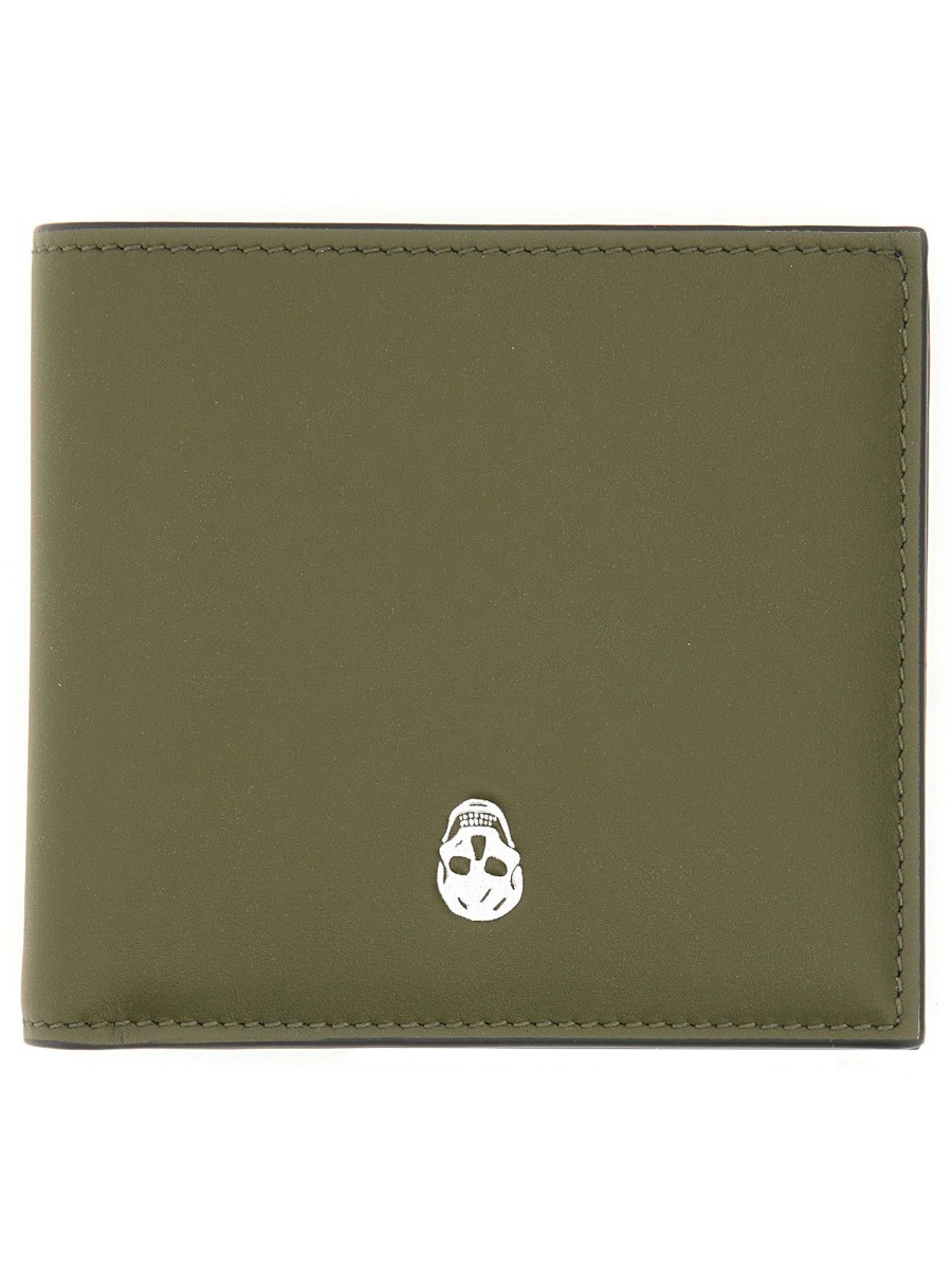 Explore the authentic Alexander Mcqueen men's BIFOLD WALLET "THE SKULL" in Brown