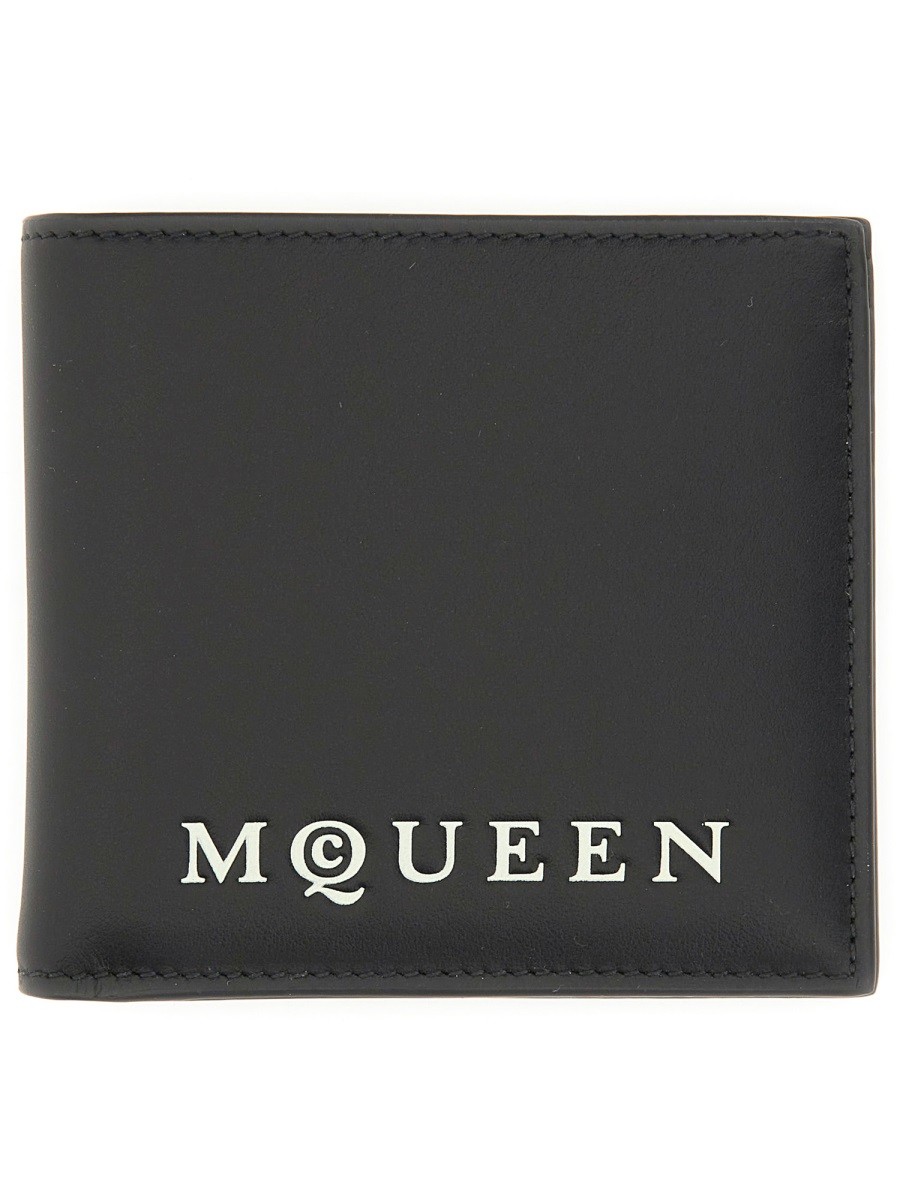 Explore the authentic Alexander Mcqueen men's BIFOLD WALLET WITH LOGO in Black