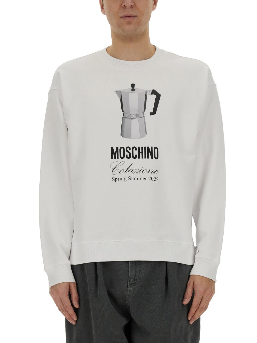 Refresh your wardrobe with the Moschino men's "BREAKFAST" SWEATSHIRT in White