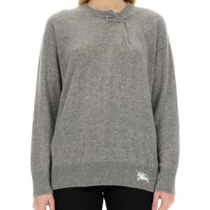 Explore the authentic Burberry women's CASHMERE SWEATER WITH KILT PIN in Grey