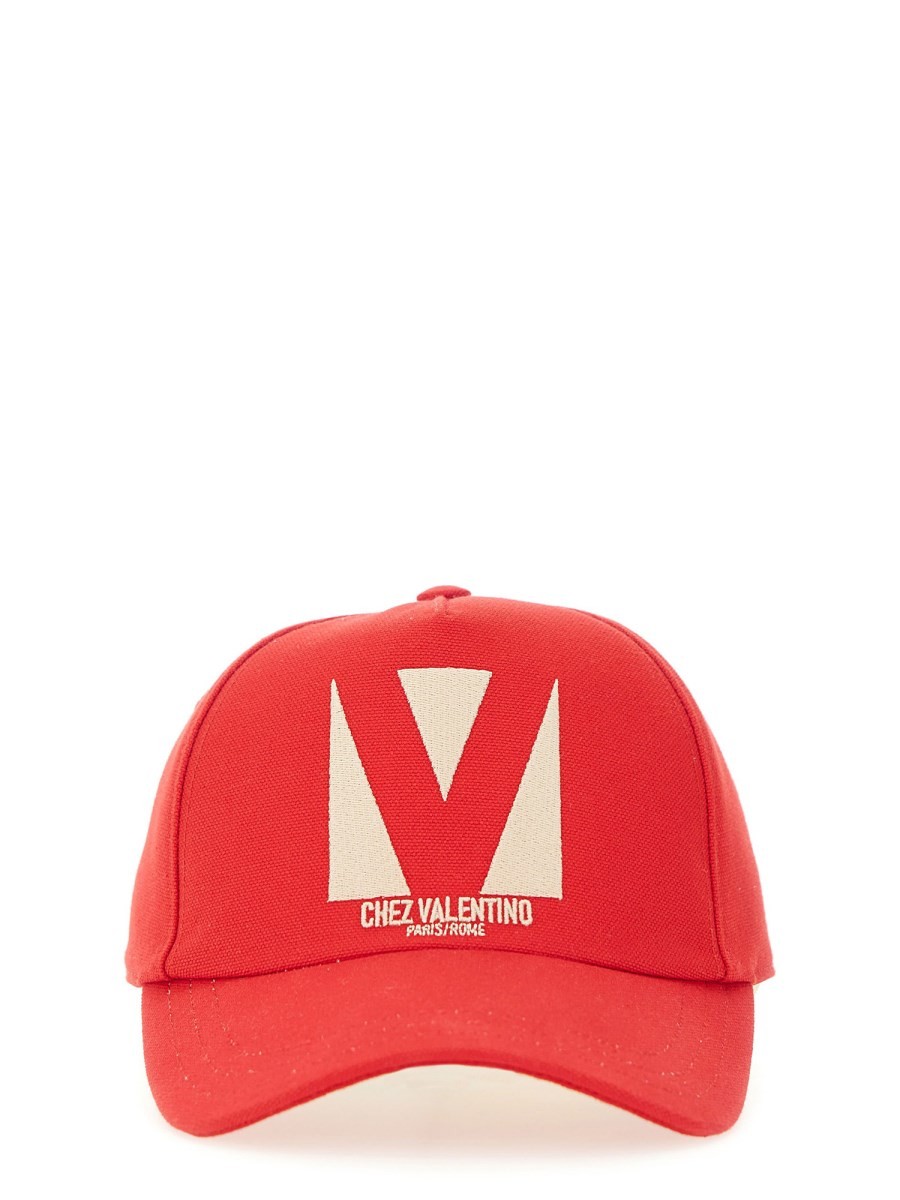 Explore the authentic Valentino Garavani women's "CHEZ VALENTINE" BASEBALL HAT in Red