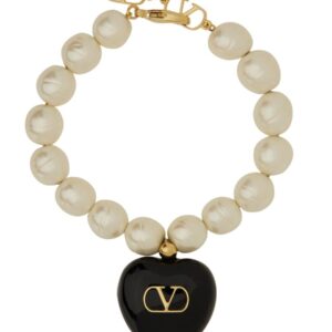 Explore the authentic Valentino Garavani women's "COEUR ROYAL" BRACELET in gold