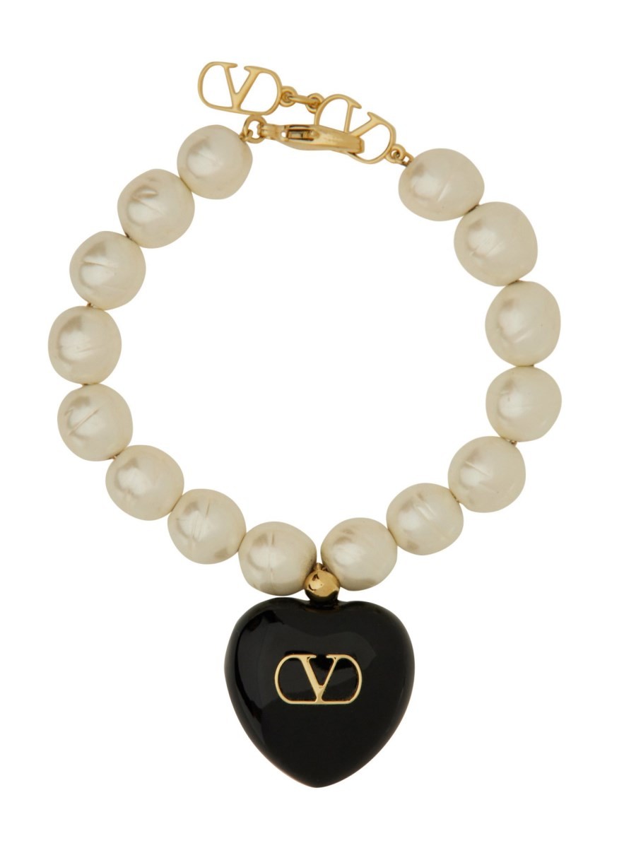 Explore the authentic Valentino Garavani women's "COEUR ROYAL" BRACELET in gold