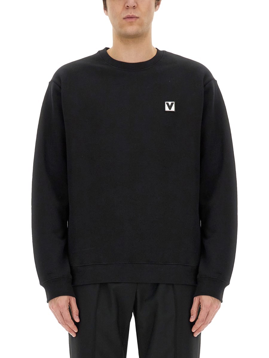Shop the authentic Valentino men's COTTON CREWNECK SWEATSHIRT WITH "CHEZ VALENTINO" PATCH in Black