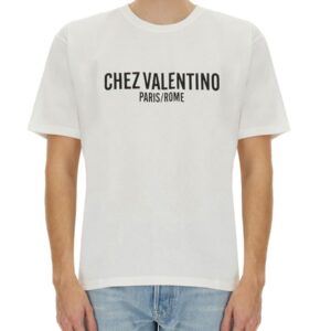 Explore the authentic Valentino men's COTTON T-SHIRT WITH "CHEZ VALENTINO" PRINT in White