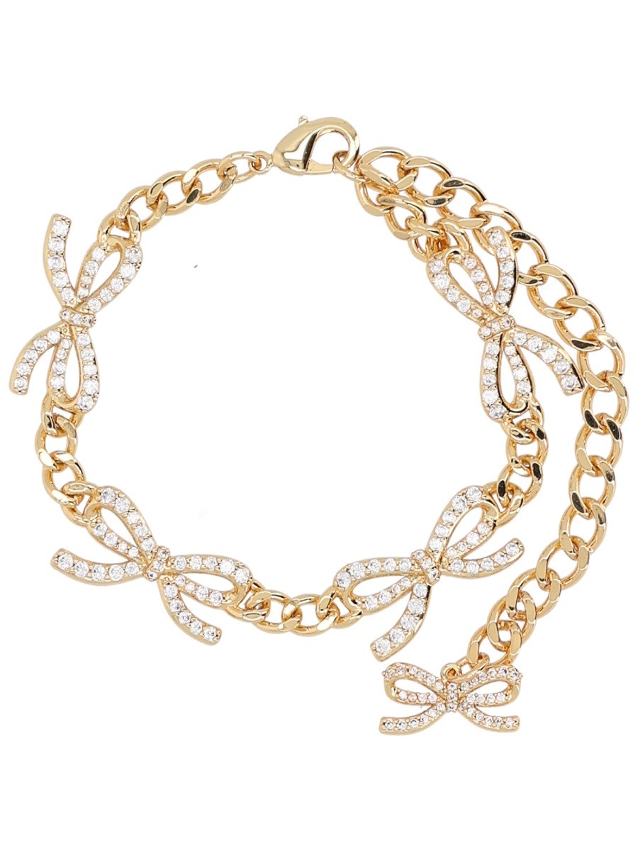 Explore the authentic SELF-PORTRAIT women's "CRYSTAL BOW" BRACELET in gold