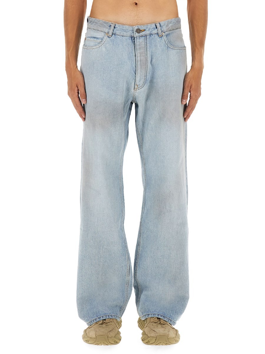 Refresh your wardrobe with the Balenciaga men's DECONSTRUCTED JEANS in DENIM