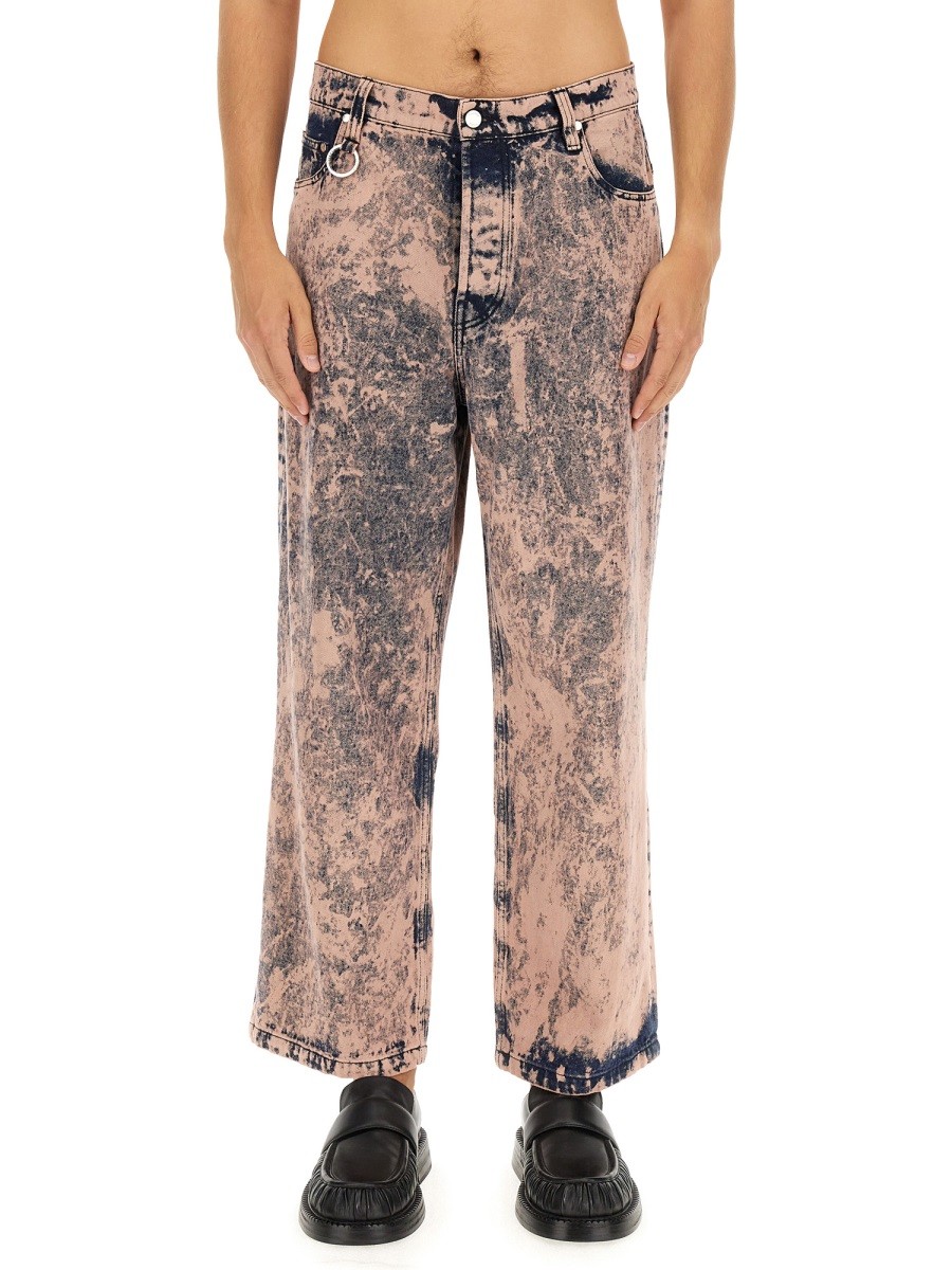 Refresh your wardrobe with the ÉTUDES men's DISTRICT OVERDYED JEANS in Pink