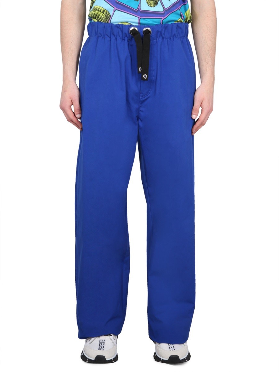 Discover the authentic Versace men's DRAWSTRING PANTS in Blue