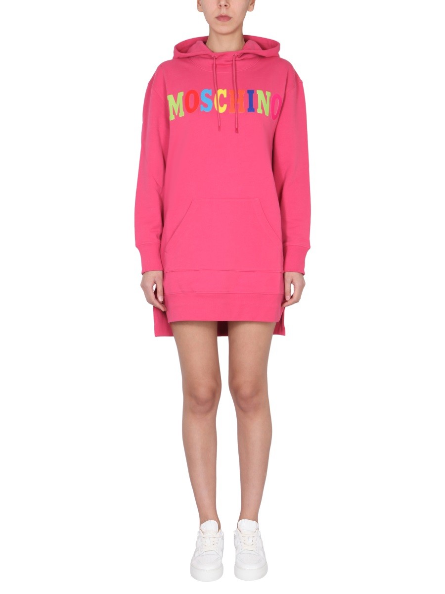 Explore the authentic Moschino women's DRESS WITH MULTICOLOR FLOCKED LOGO in Fuchsia