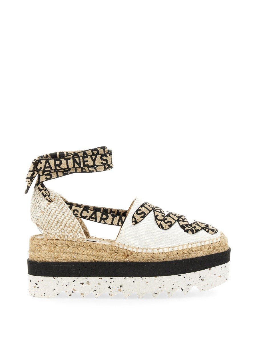 Explore the authentic stella mccartney women's ESPADRILLE "GAIA" WITH PLATFORM in beige