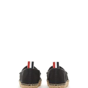 Explore the authentic THOM BROWNE women's ESPADRILLE PENNY VARSITY in Black