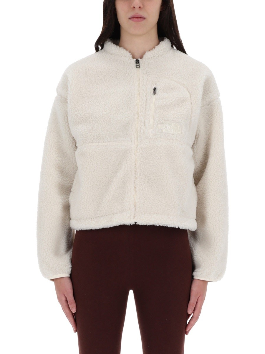 Refresh your wardrobe with the The North Face women's "EXTREME" JACKET in Ivory