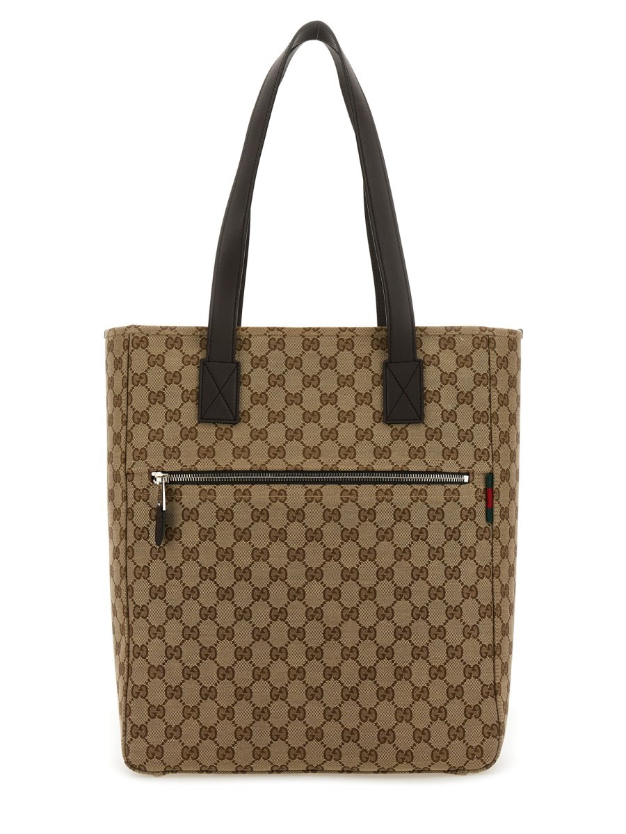 Discover the authentic Gucci men's FABRIC SHOPPING BAG GG MEDIUM in Brown