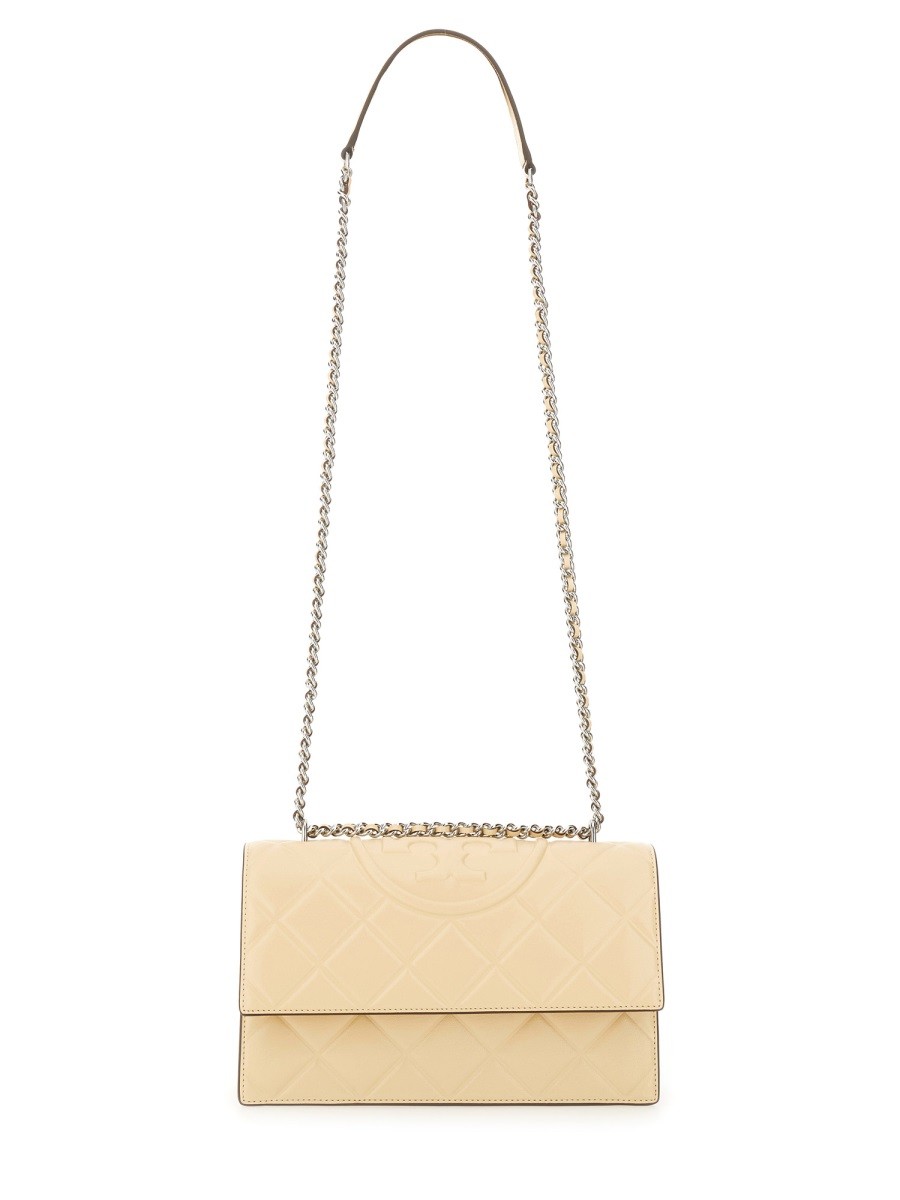 Refresh your wardrobe with the Tory Burch women's "FLEMING" BAG in beige