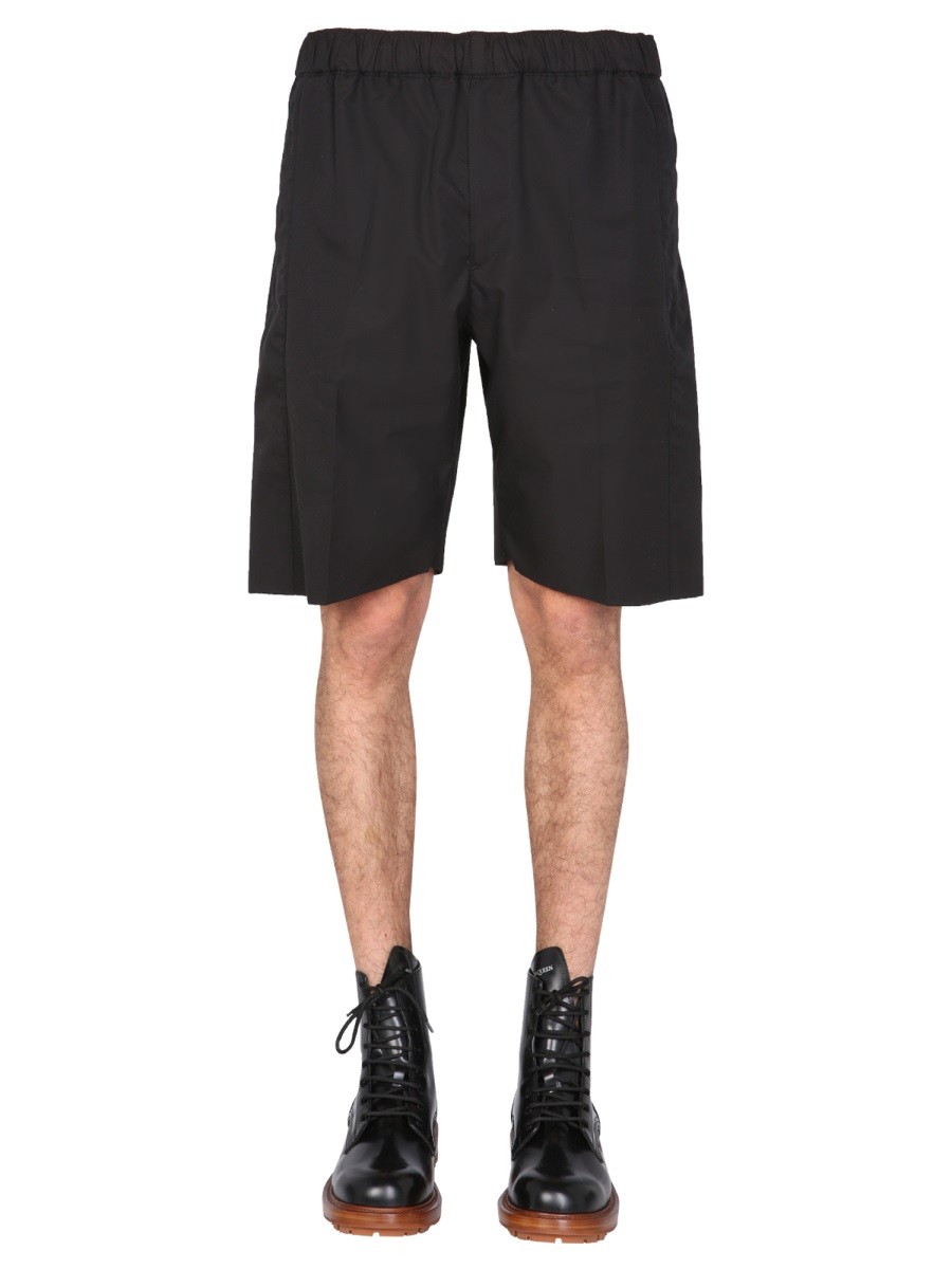 Explore the authentic Alexander Mcqueen men's GABARDINE BERMUDA in Black