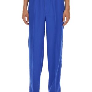 Refresh your wardrobe with the Gucci men's GG CROSSOVER PANTS in Blue