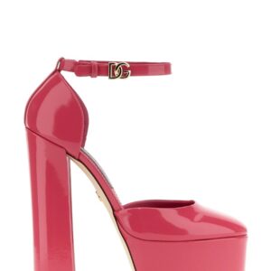 Explore the authentic Dolce & Gabbana women's GLOSSY LEATHER PLATFORM PUMPS in Pink