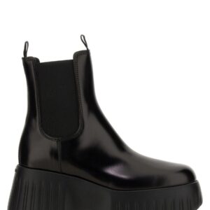 Refresh your wardrobe with the Hogan women's H-STRIPE CHELSEA BOOT in Black