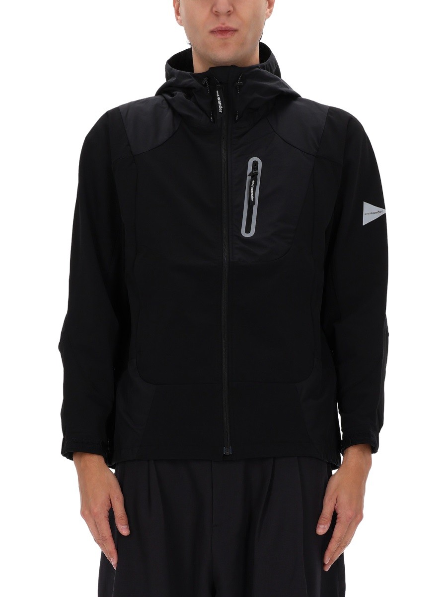 Refresh your wardrobe with the AND WANDER men's JACKET WITH LOGO in Black