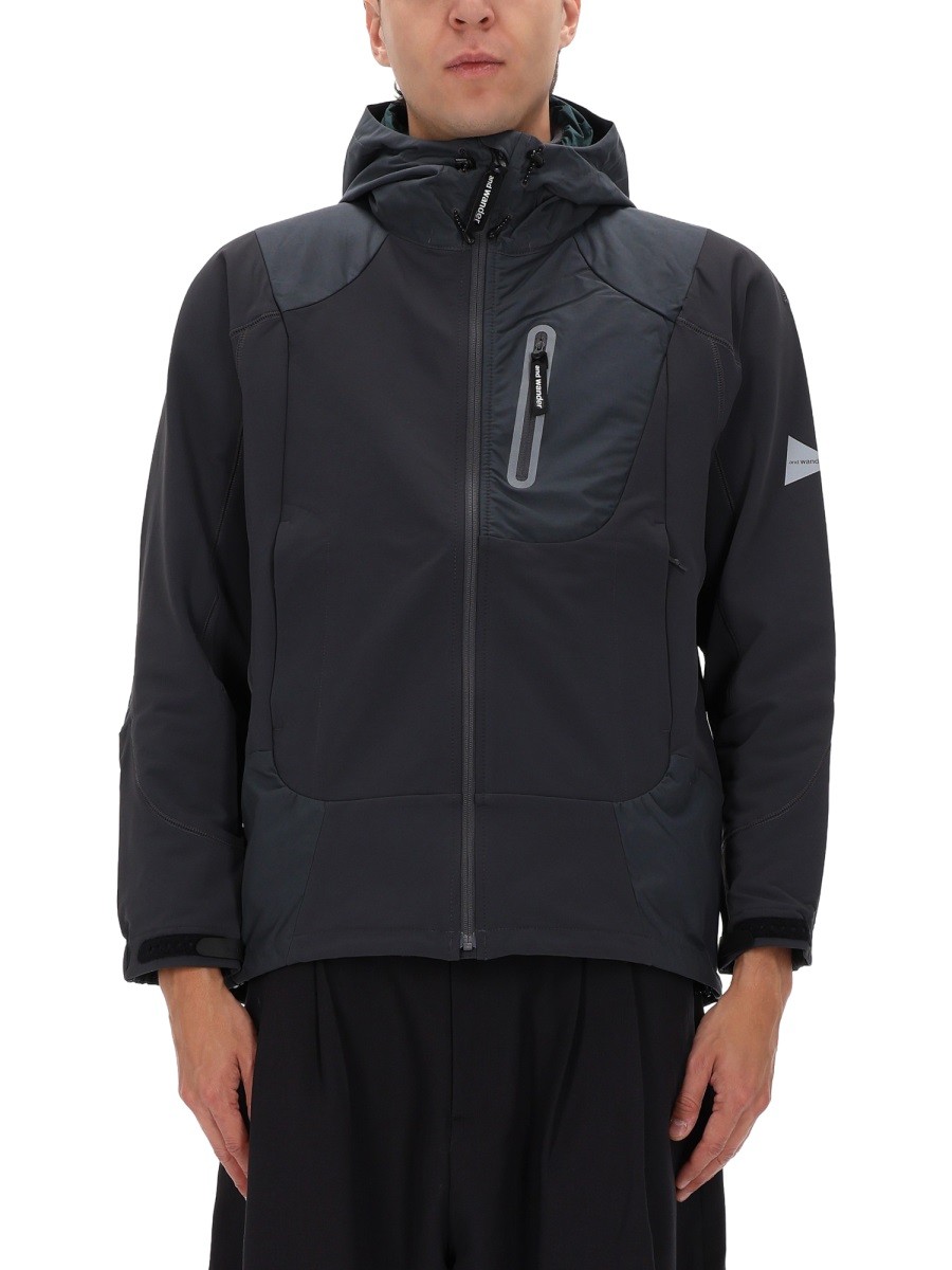 Refresh your wardrobe with the AND WANDER men's JACKET WITH LOGO in Grey