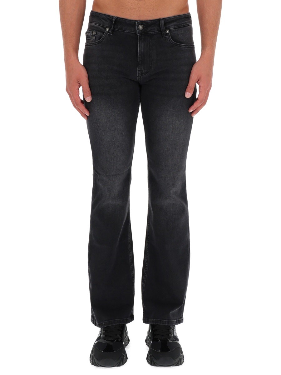 Explore the authentic Versace Jeans Couture men's JEANS SLIM PIECE NUMBER in Black