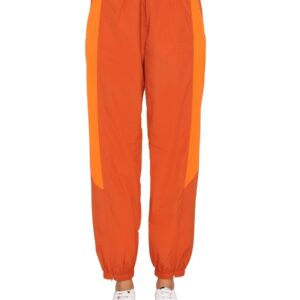 Discover the authentic Y - 3 women's JOGGING PANTS in orange