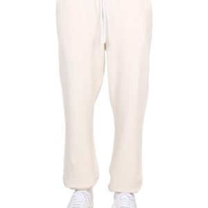 Explore the authentic MARCELO BURLON COUNTY OF MILAN men's JOGGING PANTS in POWDER
