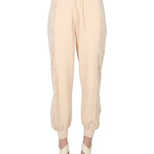 Refresh your wardrobe with the Boutique Moschino women's JOGGING PANTS in Ivory