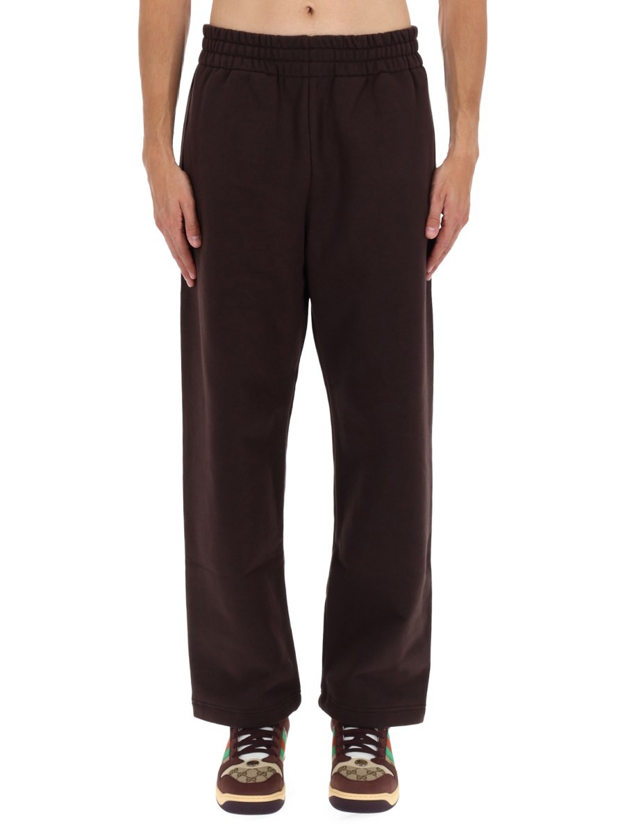 Discover the authentic Gucci men's JOGGING PANTS in Brown