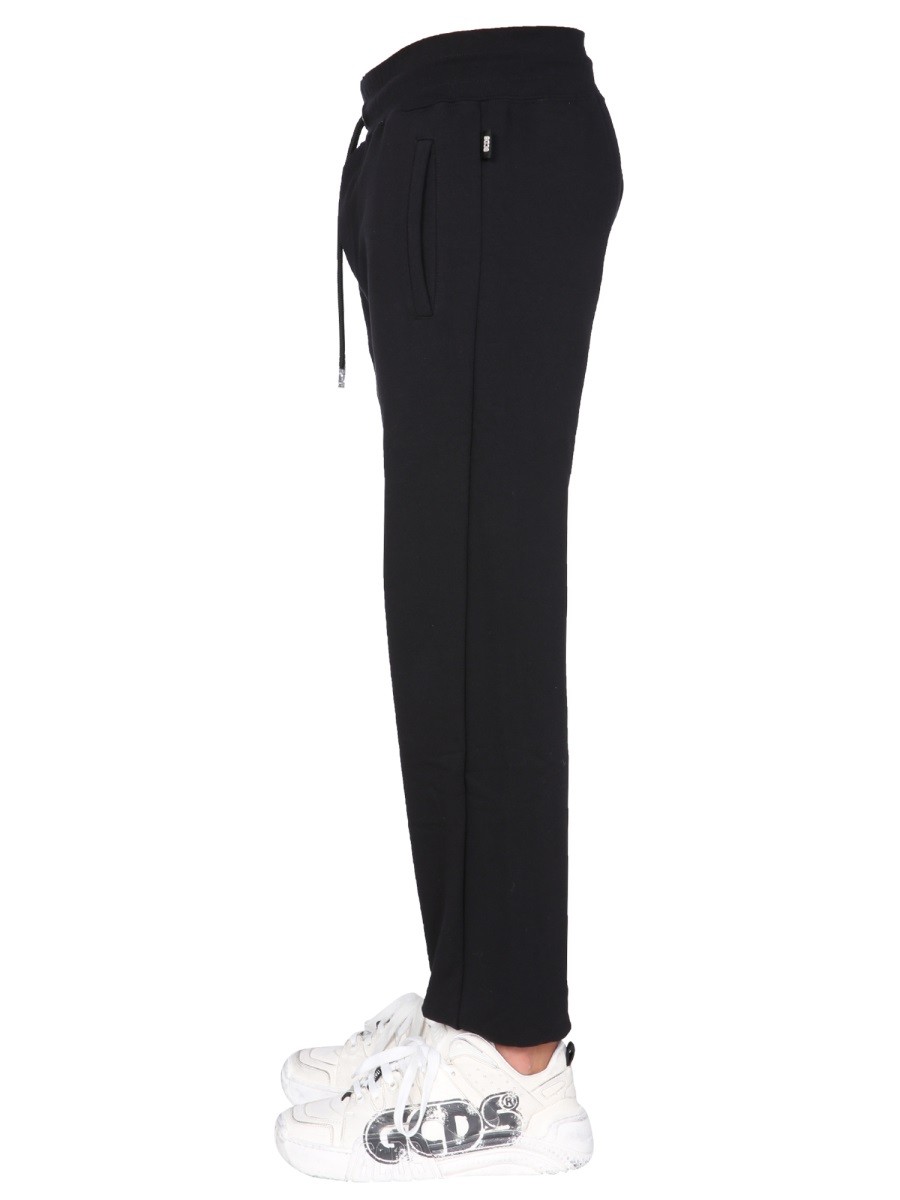 JOGGING PANTS WITH "CUTE TAPE" LOGO BAND - Image 4