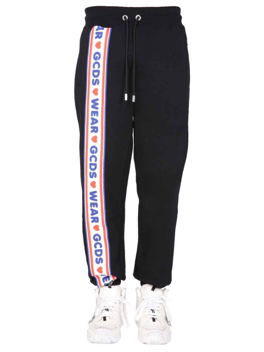 Discover the authentic gcds men's JOGGING PANTS WITH "CUTE TAPE" LOGO BAND in Black