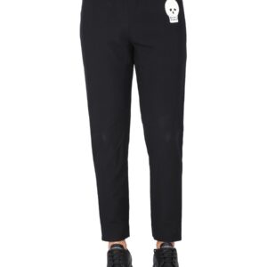Explore the authentic Alexander Mcqueen men's JOGGING PANTS WITH EMBROIDERED SKULL in Black