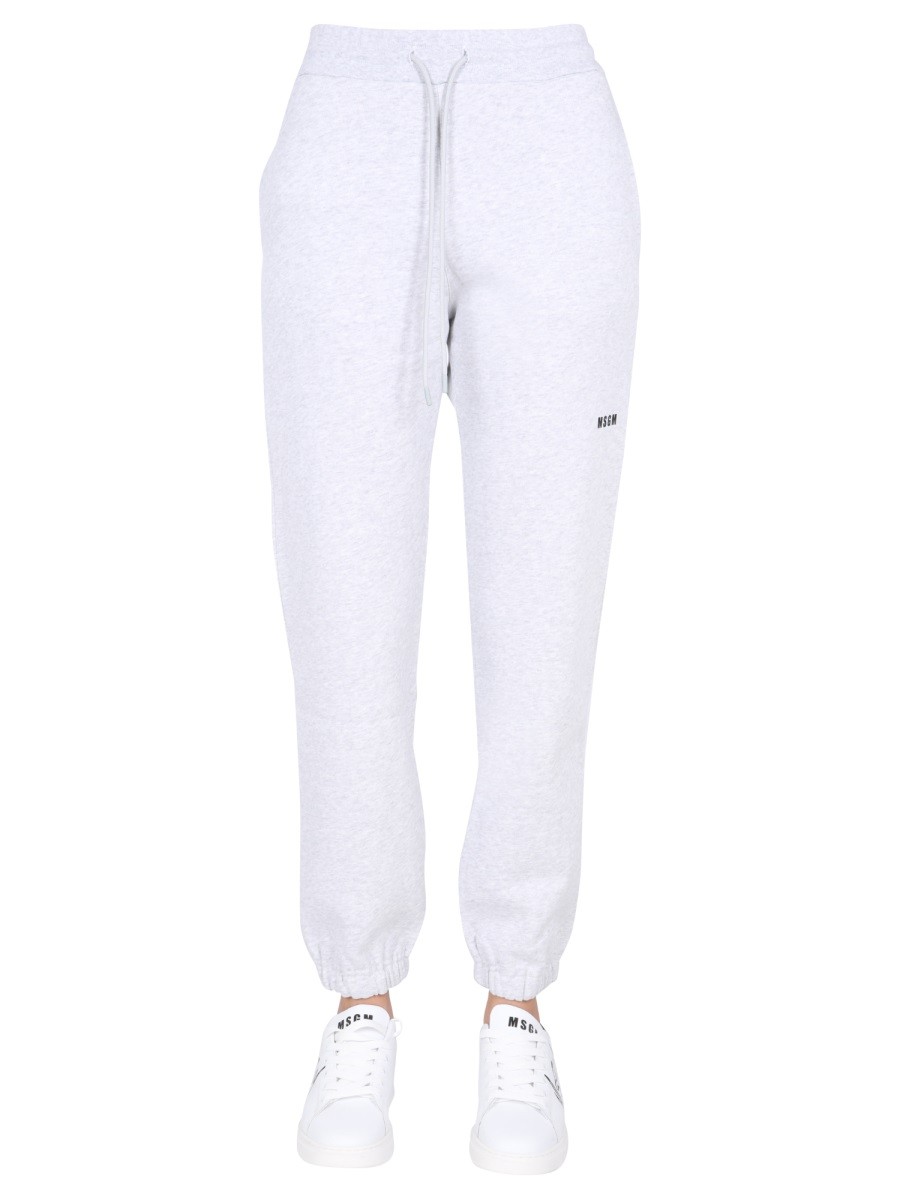 Refresh your wardrobe with the msgm women's JOGGING PANTS WITH LOGO PRINT in Grey