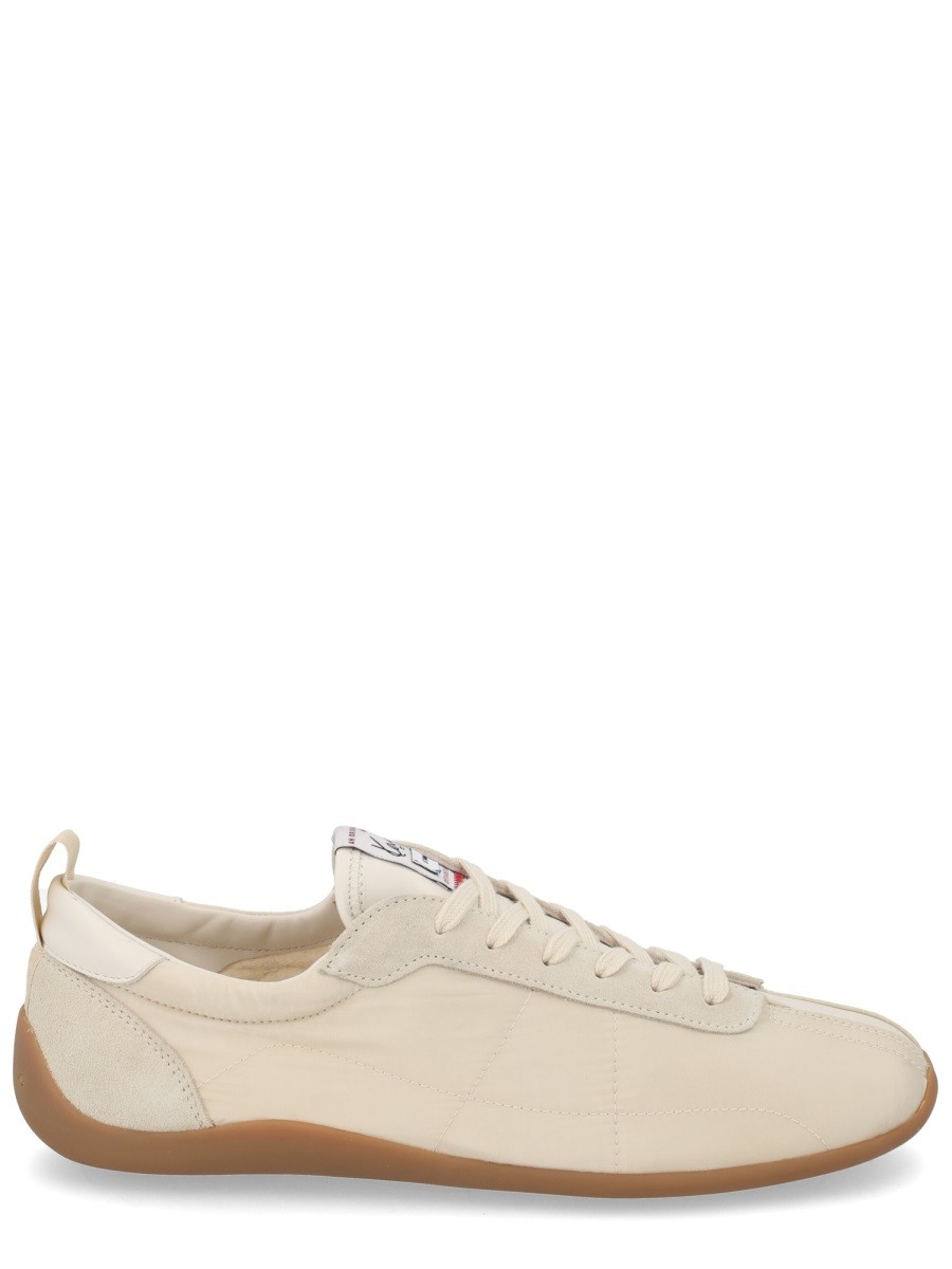 Refresh your wardrobe with the Kenzo men's "KENZO STRIKER" SNEAKER in POWDER