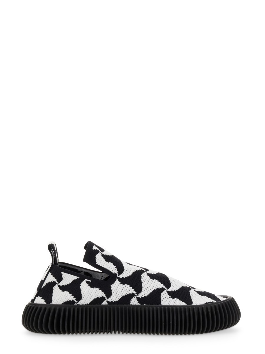 Discover the authentic Bottega Veneta women's KNIT SLIP-ON SNEAKER in Black
